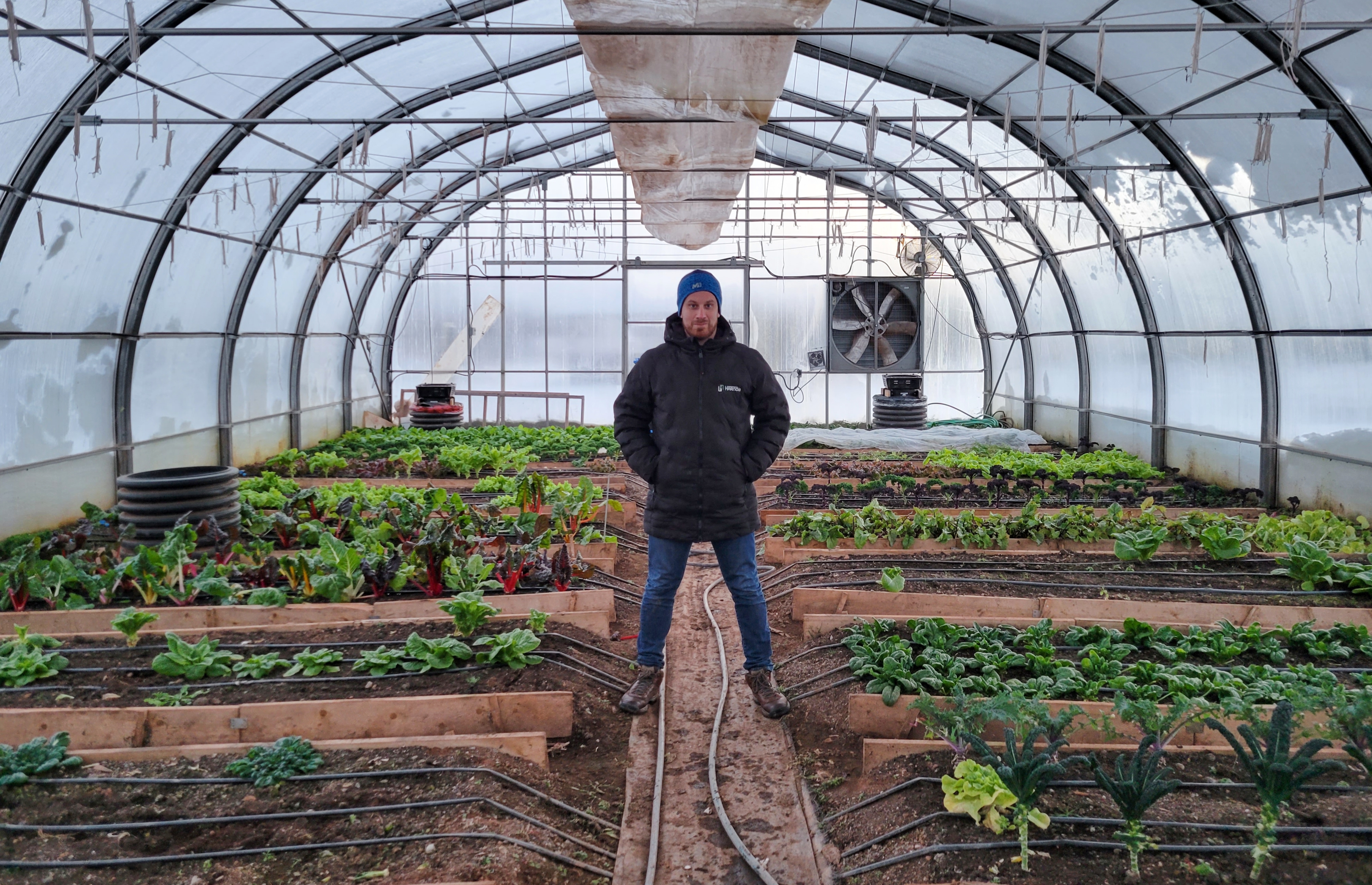 Corenthin Chassouant, agronomist visiting climate battery greenhouse in Canada
